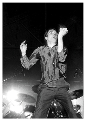 Joy Division / Ian Curtis - Futurama 1979, Queen's Hall, Leeds, 8 September 1979; image by Kevin Cummins taken from 'Joy Division by Kevin Cummins'