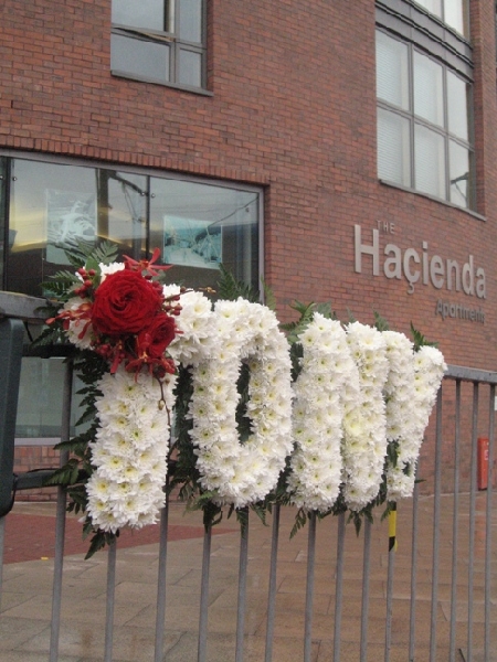 Flowers for Tony Wilson outside the Hacienda Apartments, Manchester