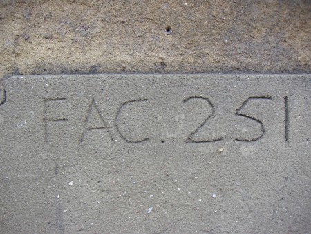FAC 251 One Charles Street in 2005; concrete block with FAC 251 inscription