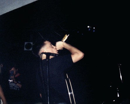 New Order live at FAC 51 The Hacienda 1983-85 - Bernard Sumner; [photo credit: Tim Sinclair]