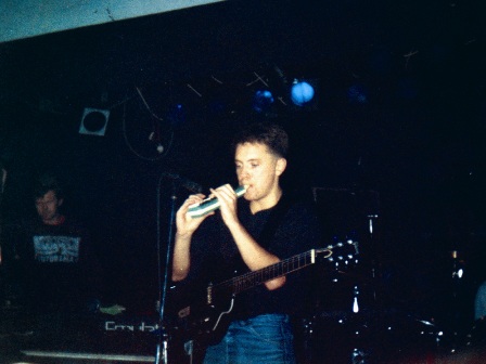 New Order live at FAC 51 The Hacienda 1983-85 - Bernard Sumner on melodica; [photo credit: Tim Sinclair]